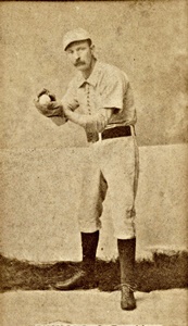 Doc Bushong with the ball on an Old Judge baseball card copyrigth 1888